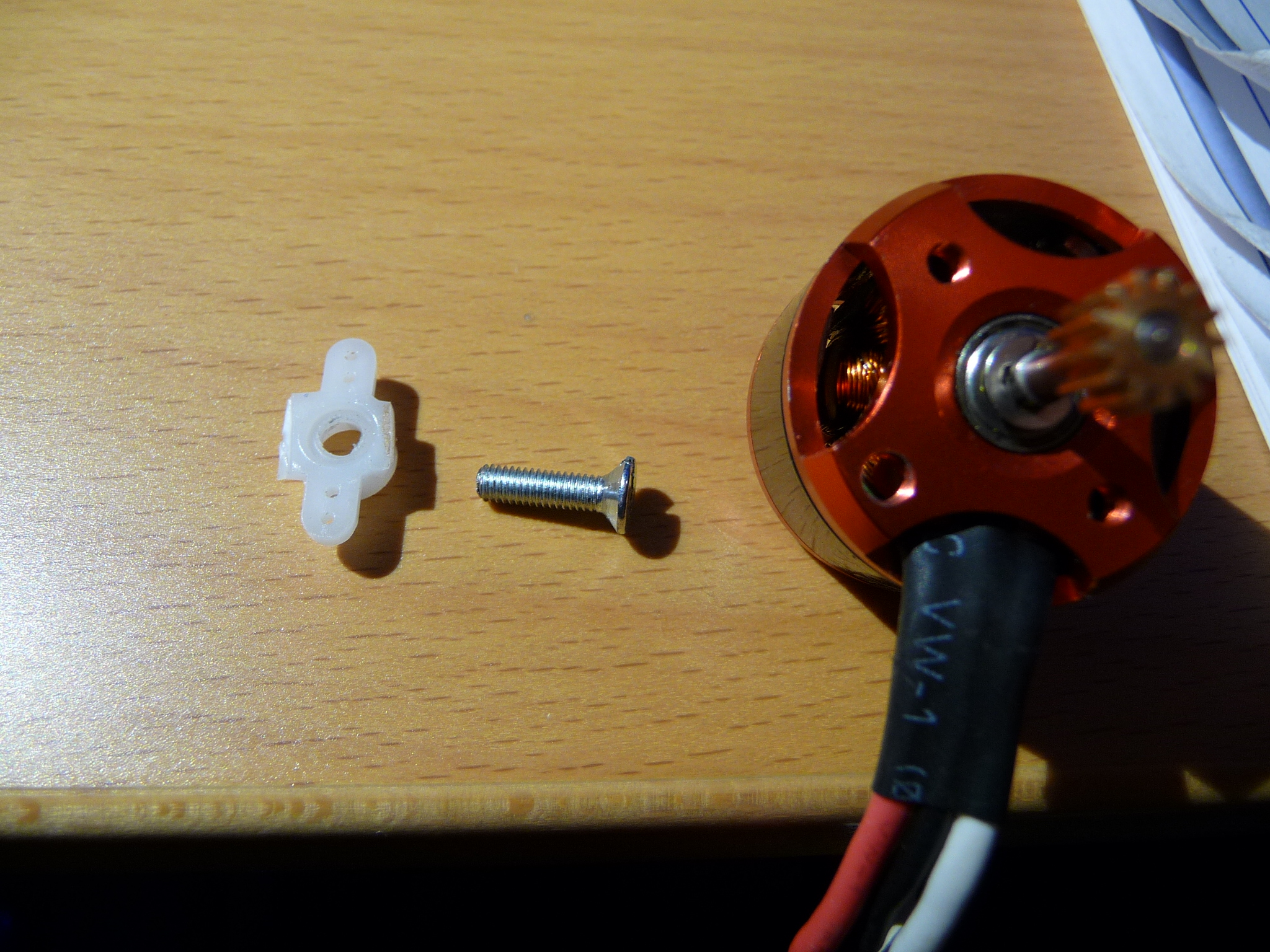 Cut down M3 screw and spacer made from a servo arm with the arms cut off